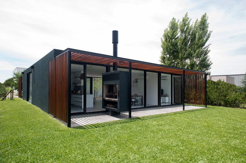 Современный дизайн одноэтажного дома из бетона и дерева