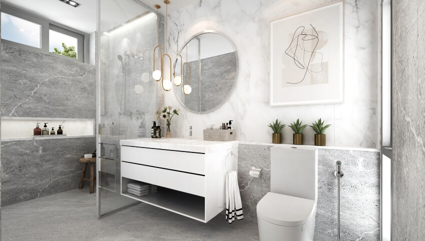 Роскошная ванная комната с подвесными светильниками, парящим туалетным столиком и стенами из серого цементного мрамора