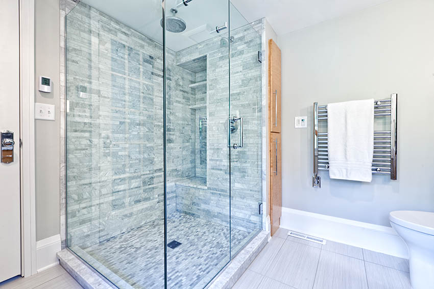 Contemporary bathroom shower with carrara marble tile