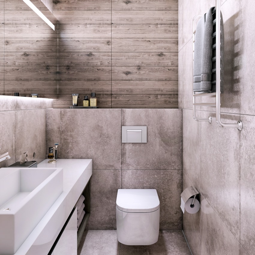 Маленькая серая ванная комната, раковина, зеркало, вешалка для полотенец