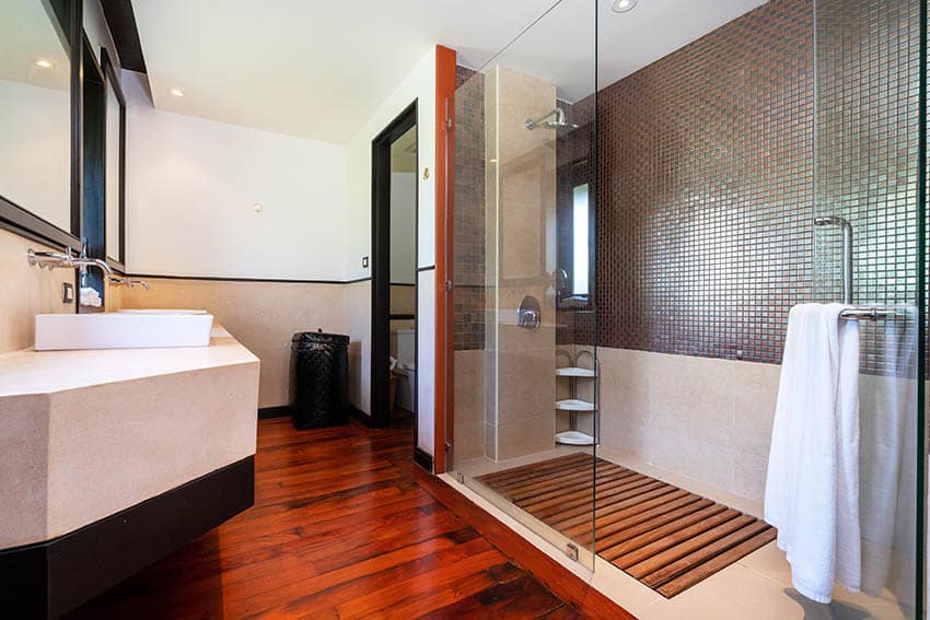 Shower with teak wood floors